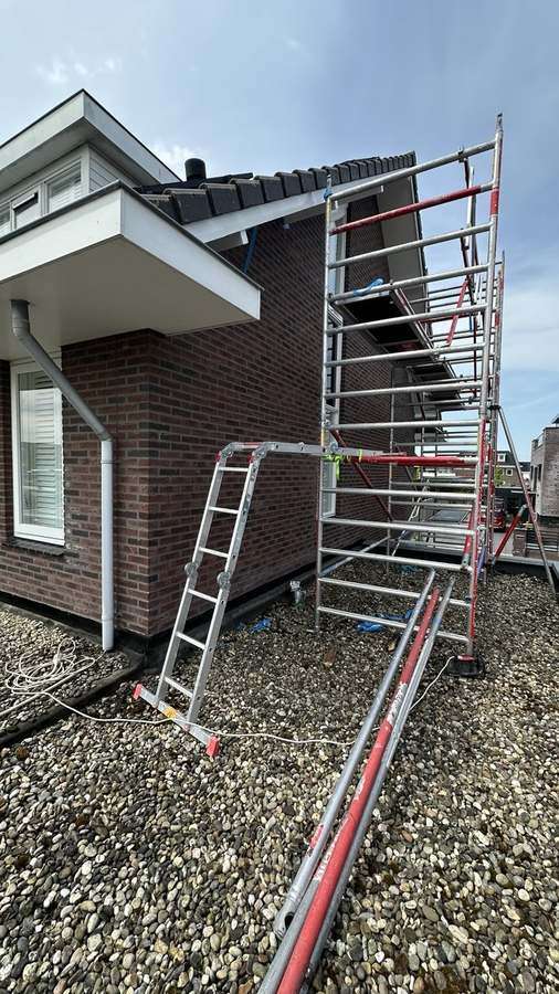 Dakwerken met steiger
